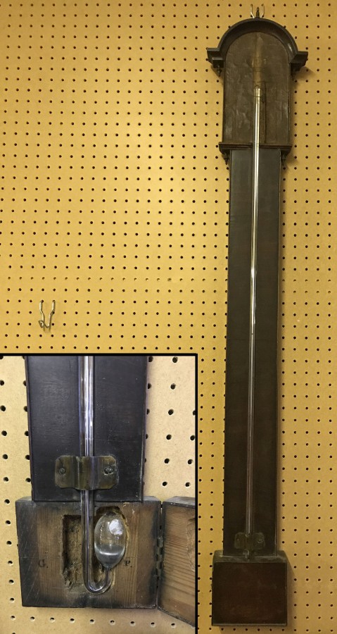 A Georgian dark wood stick barometer.
