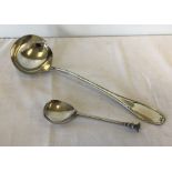 An Art Nouveau silver plated soup ladle and spoon.