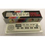 A vintage boxed Casio VL-1 electronic musical instrument & calculator.