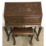 A 1960's bureau with Chinese carved decoration of coastal fishing scene.