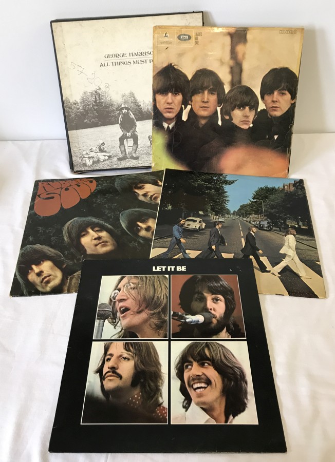 4 Beatles albums together with a George Harrison box set album.