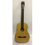 A vintage Musima 3/4 size 6 string classical guitar.