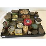 A collection of vintage advertising tins.