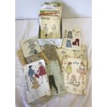 A small collection of vintage children's and men's clothing patterns.