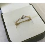 An 18ct gold & diamond solitaire ring.