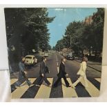 The Beatles, Abbey Road vinyl LP on Apple Records.