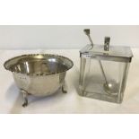 A silver sugar bowl with fluted edge design together with a Deco style preserve pot and spoon.