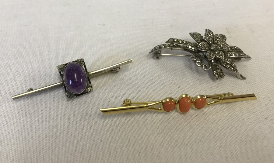 3 vintage silver brooches.
