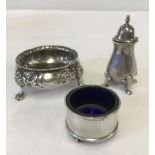 2 silver salts, one with blue glass liner, together with a silver pepperette.