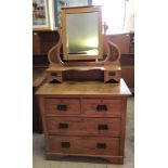 A vintage pine mirror backed chest of drawers / dressing table.