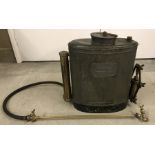 A vintage Four Oaks knapsack sprayer.