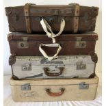 4 vintage suitcases.