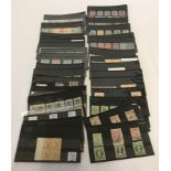 A collection of vintage British Empire stamps, both mint and used.