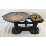 A set of vintage scales with copper bowl and brass weights
