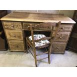 A light oak pedestal desk & chair.