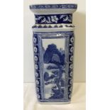 A square shaped oriental blue and white ceramic stick stand / vase.