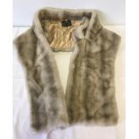 A vintage faux fur stole of light colouration by Tissavel, France.