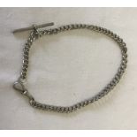A hallmarked silver albert watch chain with T bar and clip fastening.