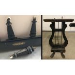 3 large carved wooden legs, keyboard lid and lyre shaped pedal stand.