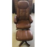 A tan leather armchair & footstool.