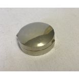 A 925 silver circular lidded pill box.