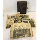 A vintage photograph album together with a quantity of vintage newspapers.