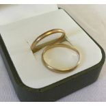 Two 22ct gold wedding bands.