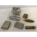 A small collection of assorted items to include vesta cases and a Ronson Crown table lighter.