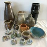 A box of assorted ceramics.
