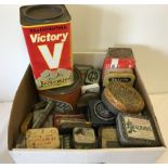 A box of vintage collectable tins.