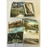 A box of vintage postcards.