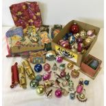 A crate of vintage Christmas decorations.