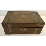 An inlaid wooden jewellery box with internal tray.