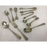 10 vintage silver cutlery items.