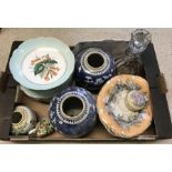 A box of assorted ceramics and glass.