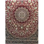 A new Keshan rug with red background.