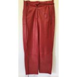 A pair of vintage red soft leather ladies trousers.