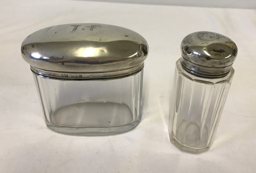 2 silver topped vanity jars monogrammed T.F.