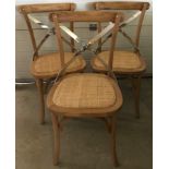 3 modern natural oak dining chairs with chrome crossover detail to back and padded rush seats.