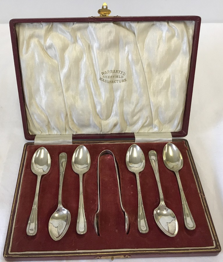 A cased set of 6 vintage EPNS coffee spoons with sugar tongs.