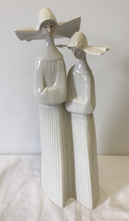 A Lladro figurine #4611 Two Nuns.