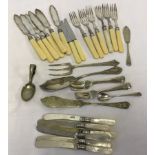 A collection of silver collared & silver plated cutlery.
