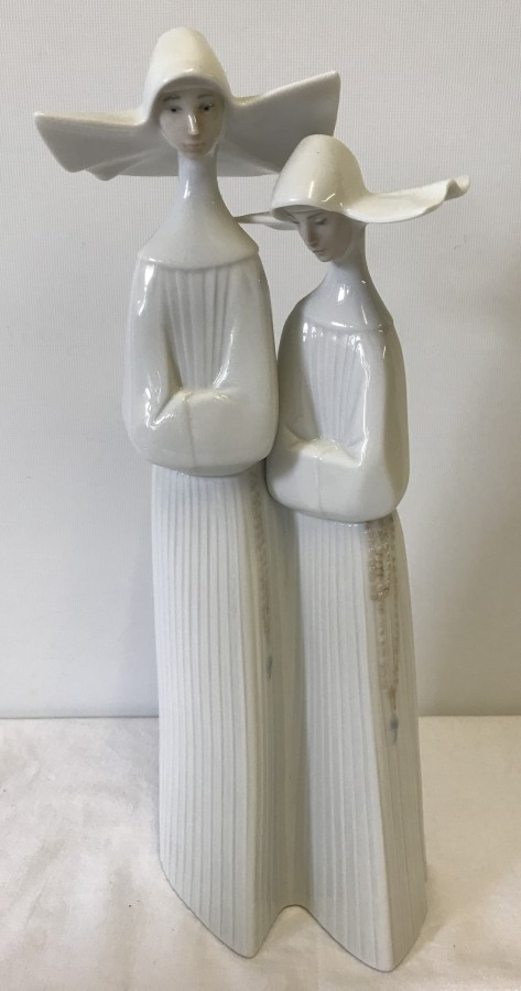 A Lladro figurine #4611 Two Nuns.