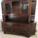 A large Oak Old Charm style, Larkswood Ltd display unit with 2 end corner units.