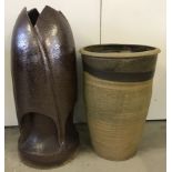 A bomb shaped brown glazed vintage chimney pot. Together with a large garden planter.