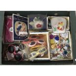 A box of assorted vintage vanity items to include vintage plastic sunglasses & mink buttonhole.