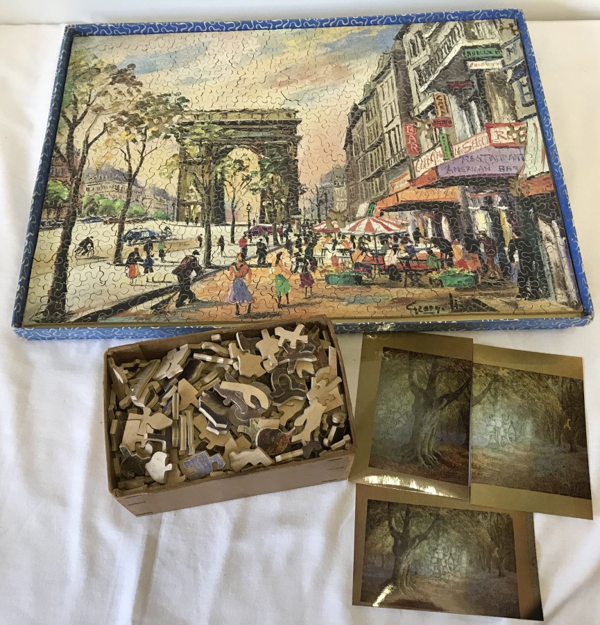 2 large wooden jigsaw puzzles (some pieces missing).