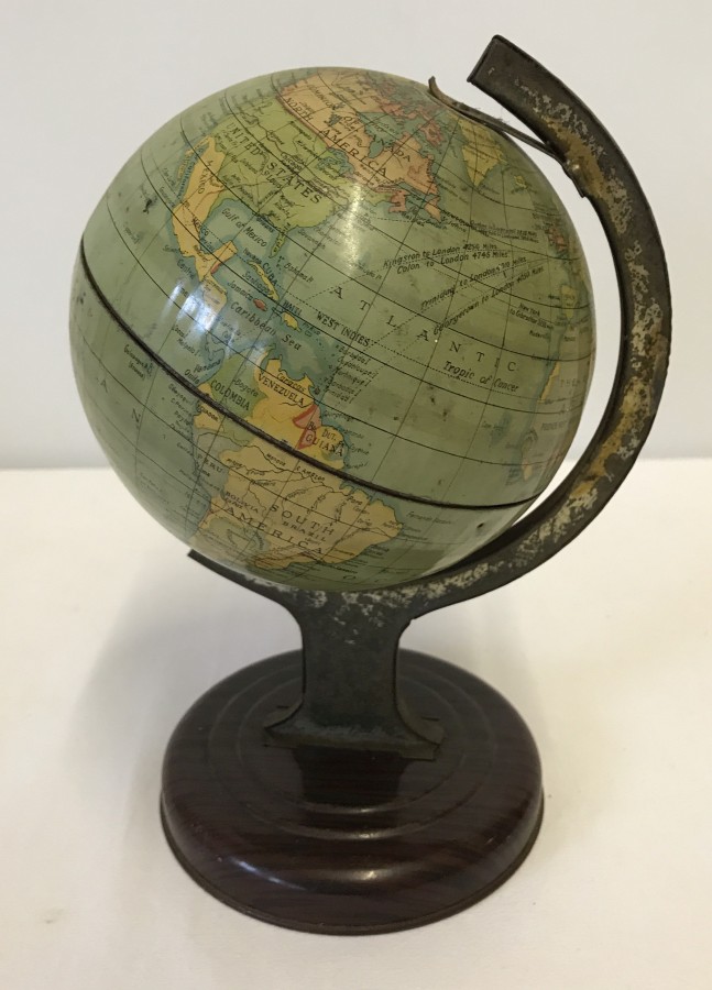 A c1940/50's Chad Valley tinplate globe.