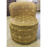 A Sherbourne gold upholstered bedroom chair.