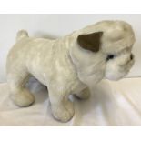 A Merrythought Bulldog soft toy.